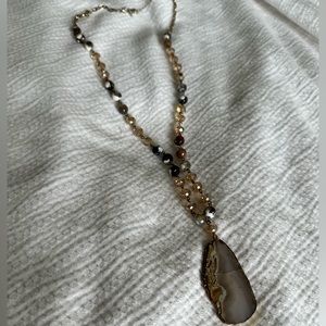 Beaded necklace with rock stone pendant